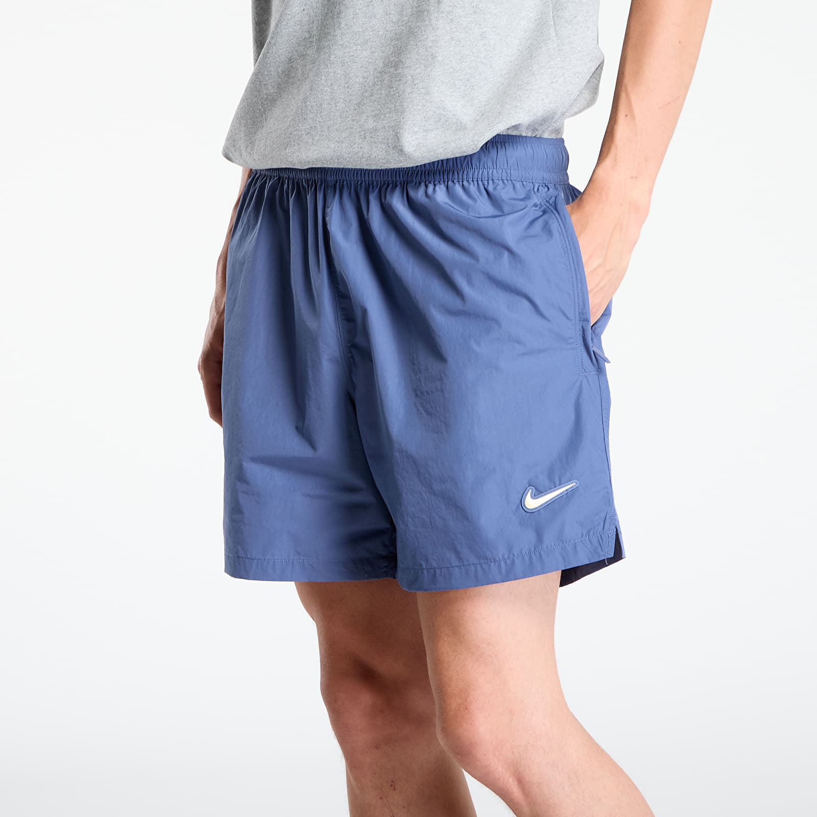 Šortai Nike x NOCTA Cardinal Nylon Shorts Diffused Blue/ Black/ Citron Tint