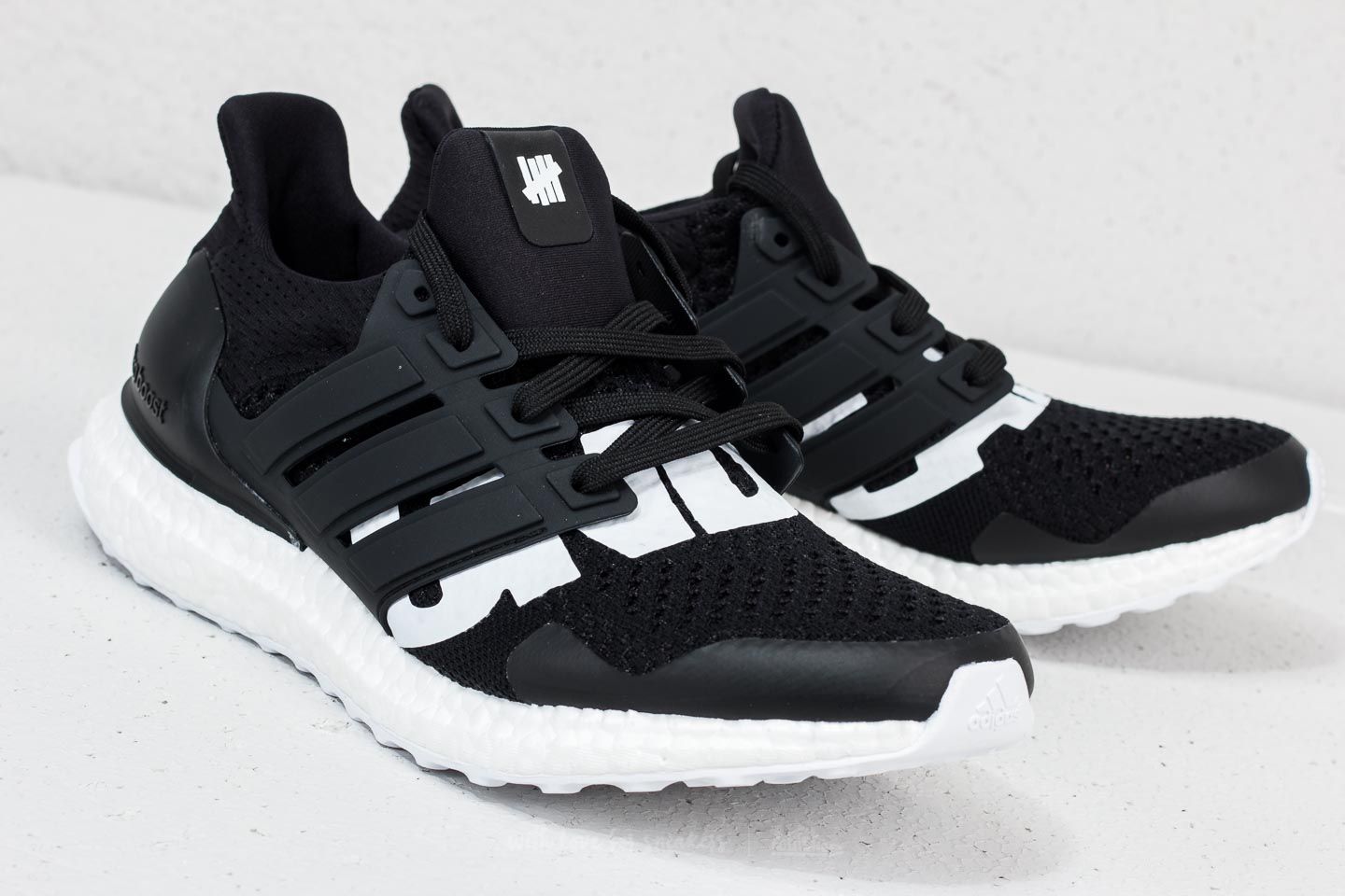 Undefeated ultra boost on sale