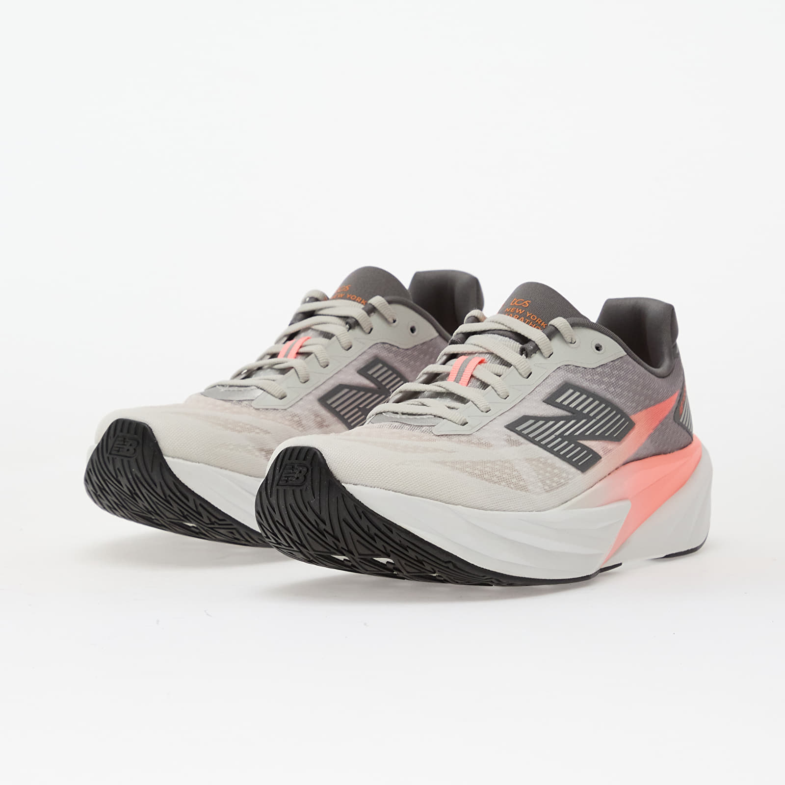Scarpe uomo New Balance Fuelcell Rebel v5 Ny5  Grapefruit/ Grey Matter/ Poppy