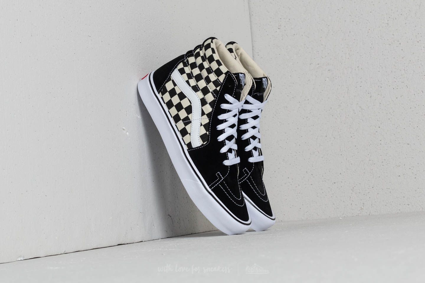 Vans sk8 hi lite black sale and white