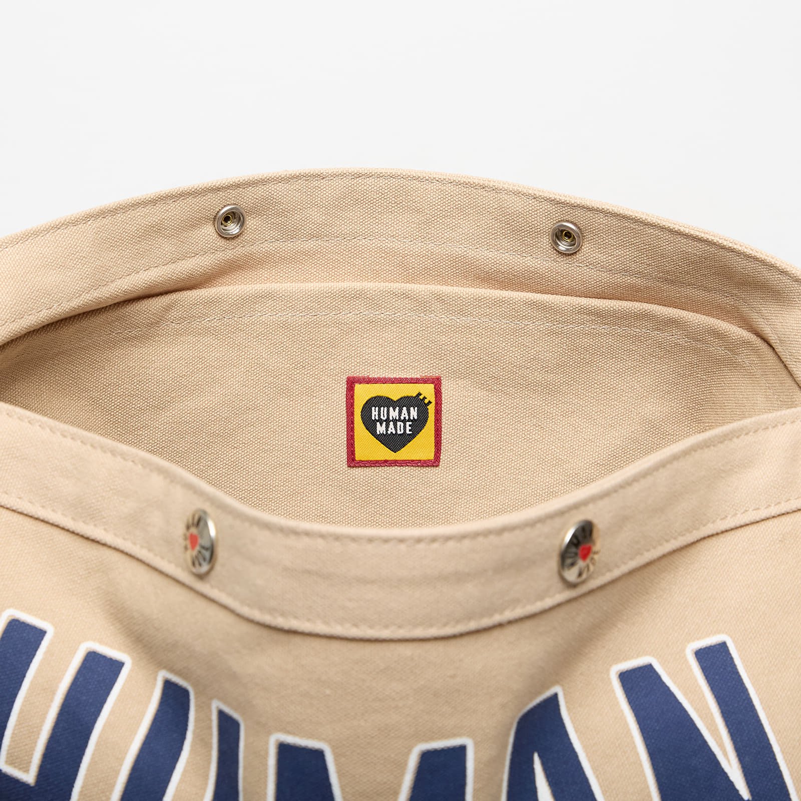 Ristilaukut HUMAN MADE Paperboy Bag Beige
