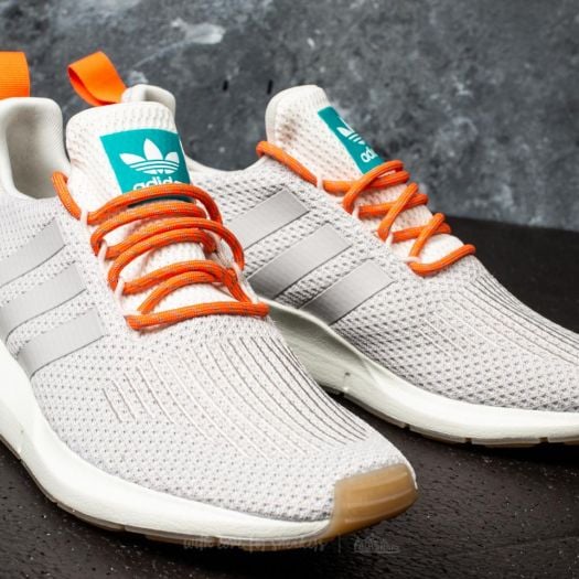 Swift run white shoes deals