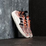 Adidas originals f/22 primeknit best sale trainers trace orange/core black/core black