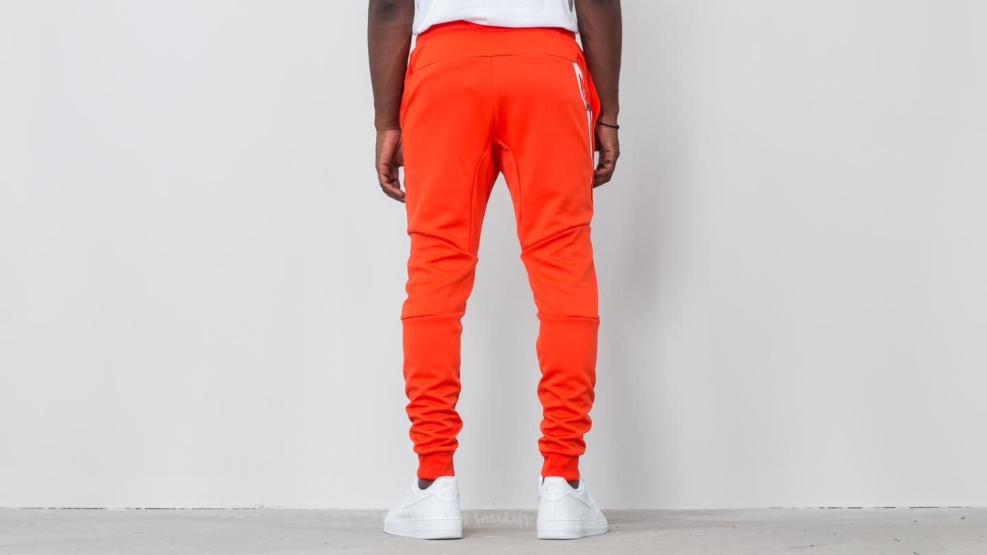 Orange nike deals tech pants