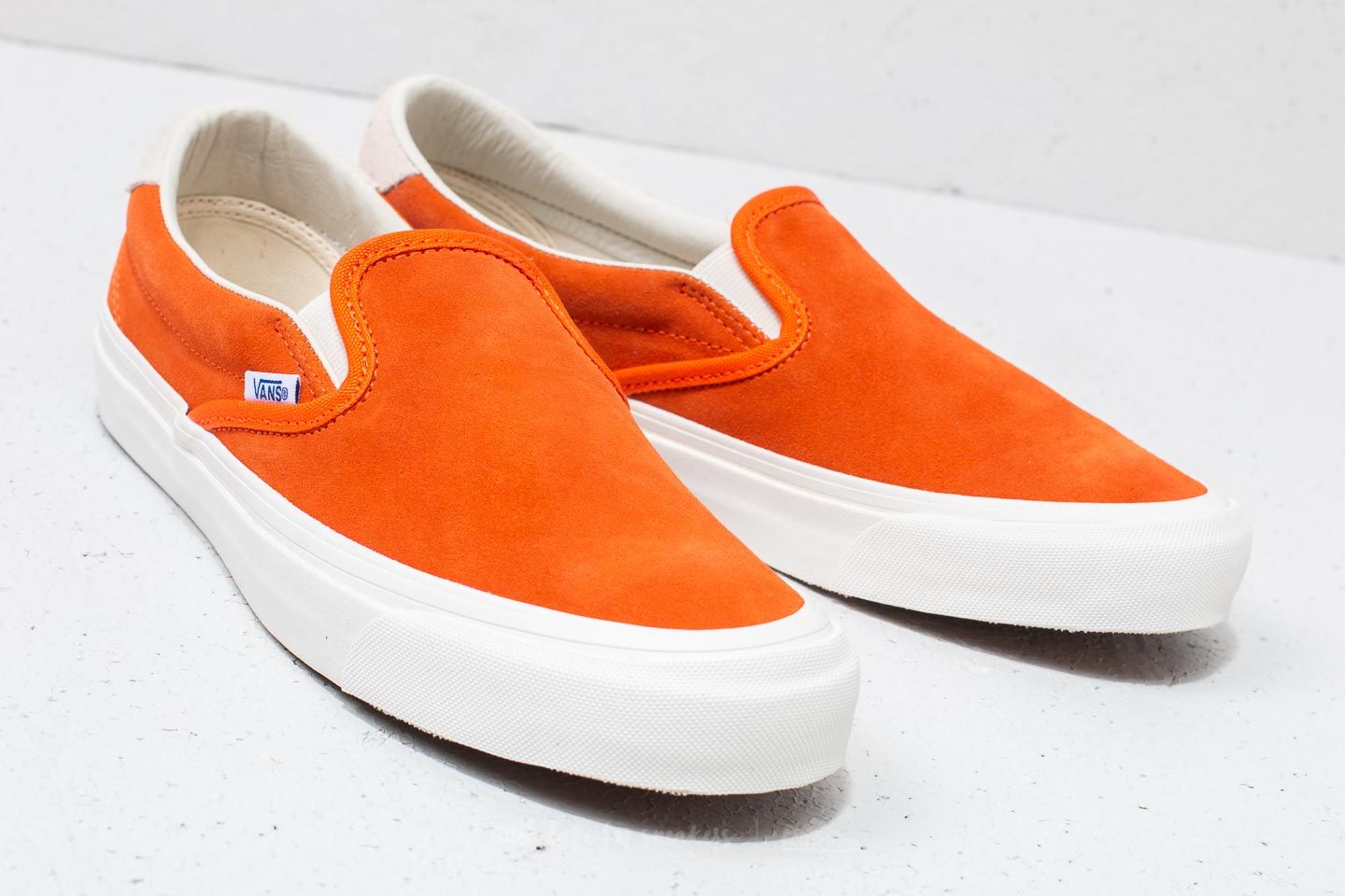 Vans orange slip on discount