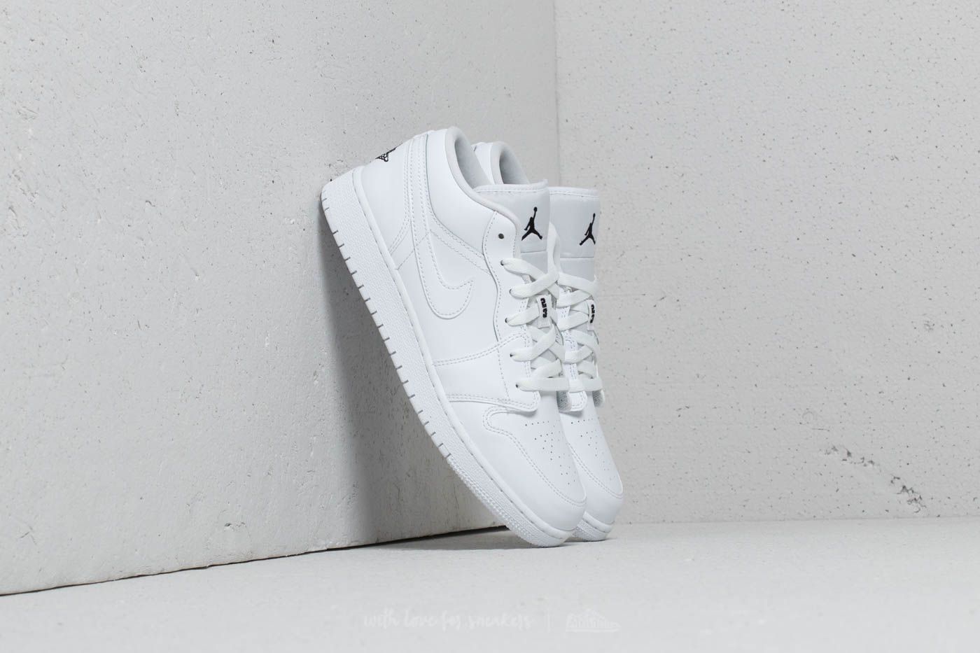 white low top air jordans