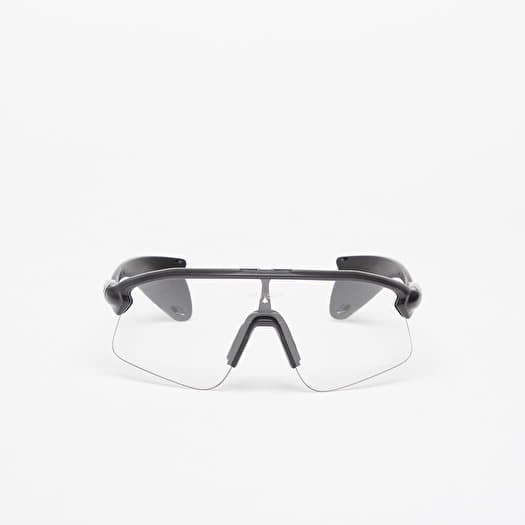 Saulesbrilles Oakley x Satisfy Stunt Devil Clear Photochromic Policarbonate Photochromic Matte Black Ink