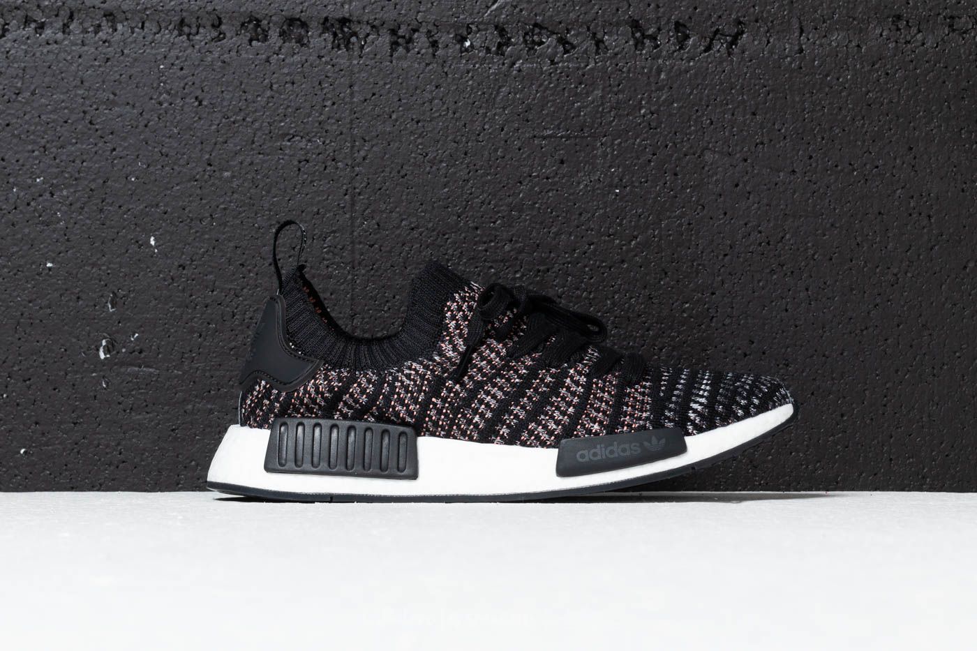 Men s shoes adidas NMD R1 STLT Primeknit Core Black Grey Four Solar Pink Footshop