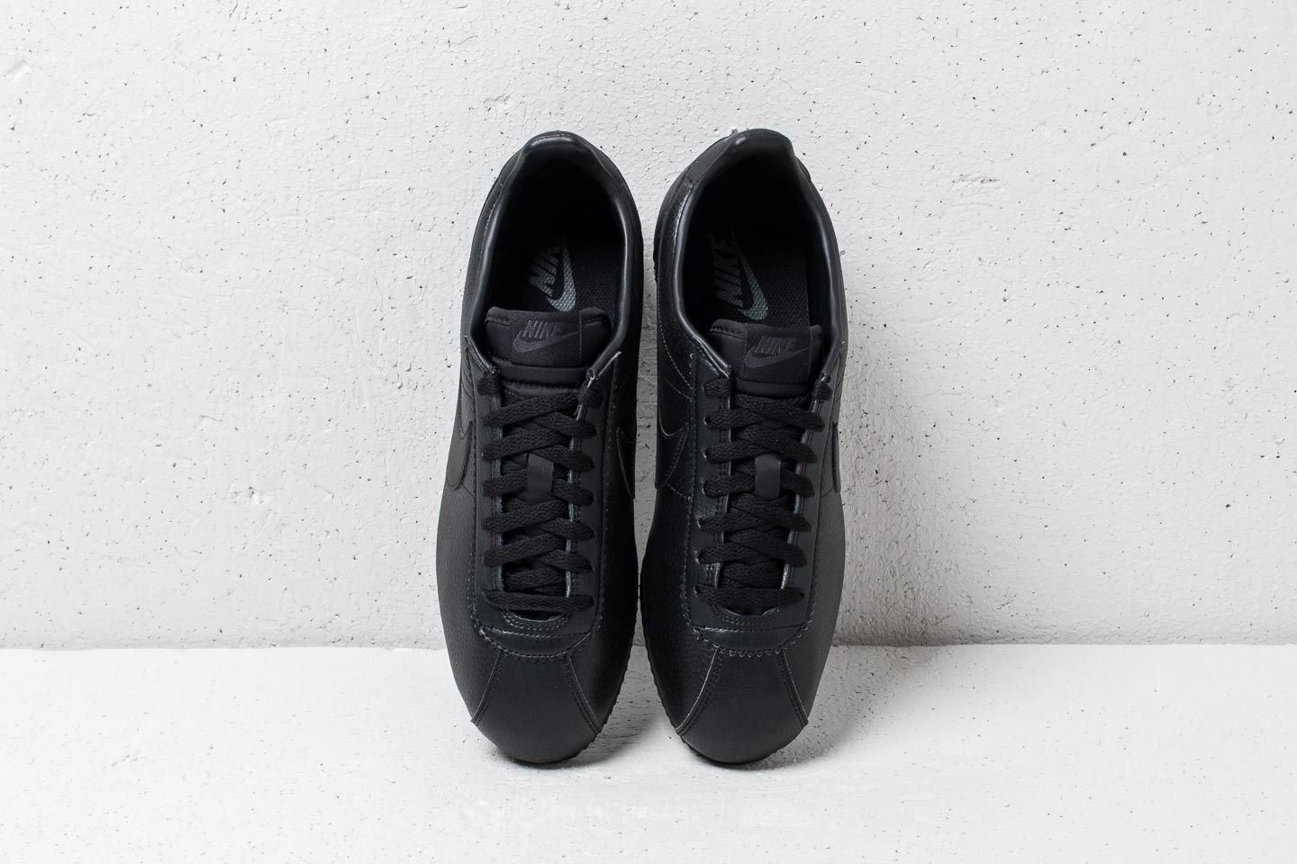 All black leather nike cortez mens deals