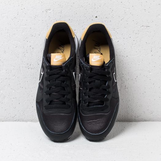 Women s shoes Nike Wmns Internationalist Heat Black Black Wheat Gold Footshop