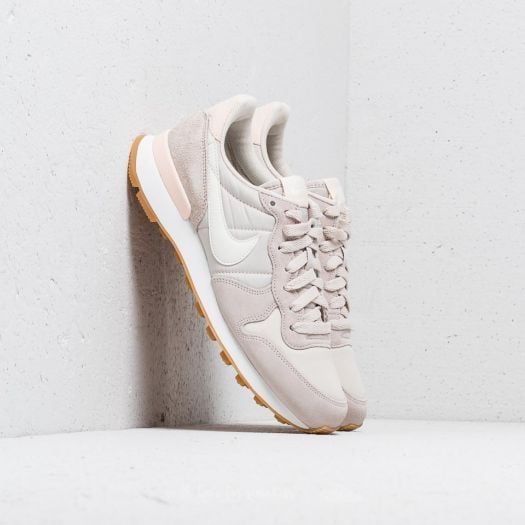 Nike wmns internationalist sunset tint/cool grey top