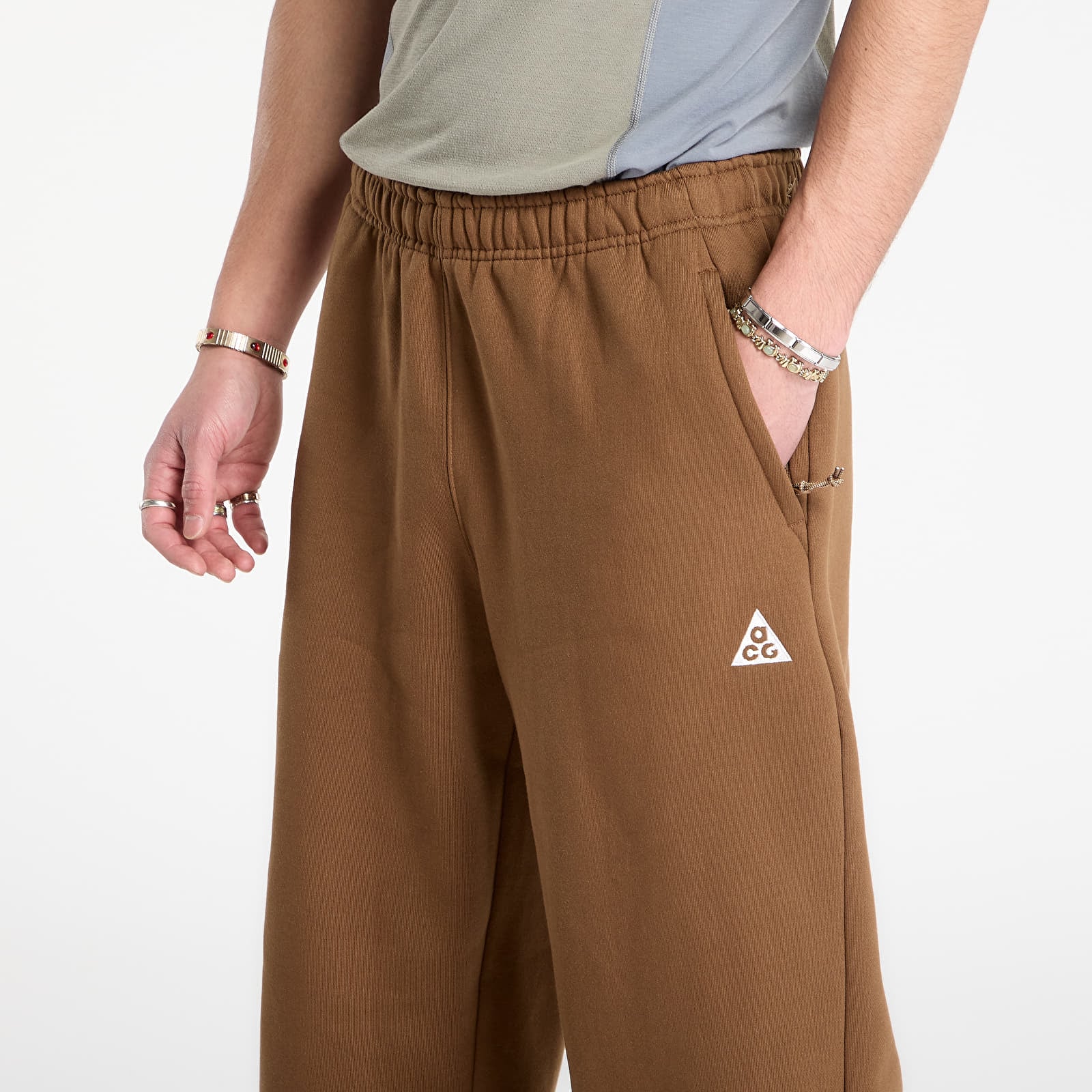 Jogger bikses Nike ACG "Tuff Fleece" Pants Mosswood Brown/ Summit White