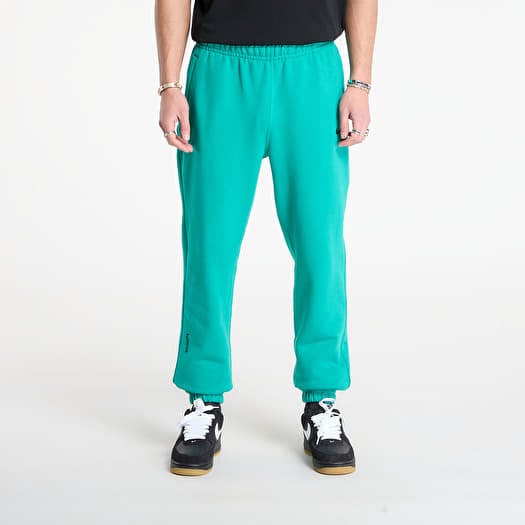 Tepláky Nike x NOCTA Fleece CS Sweatpants Neptune Green/ Black