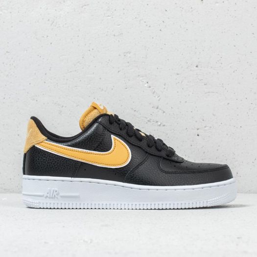 black nike with gold swoosh womens