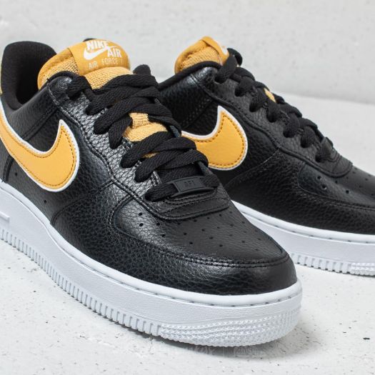 black nike with gold swoosh womens