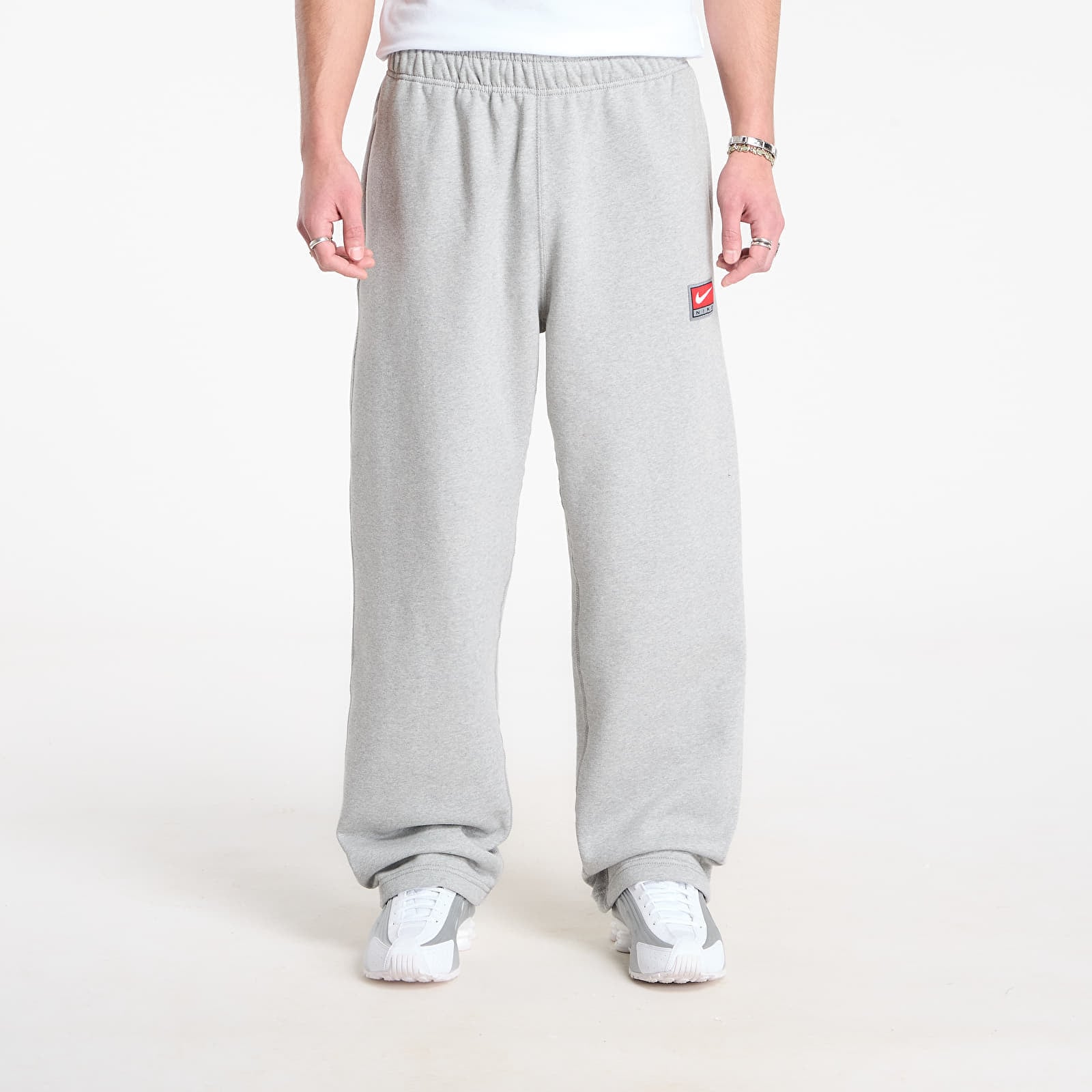 Pantaloni de trening Nike Solo Swoosh Mens Fleece Open-Hem Pants Dk Grey Heather/ White L