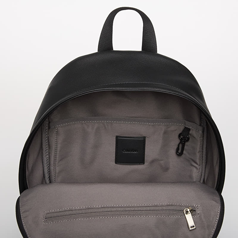 calvin klein leather backpack mens Men Emblem Black Poly W29 minimal aesthetic that often dedicates sole detail to iconic branding Calvin Klein Rucksack - ck