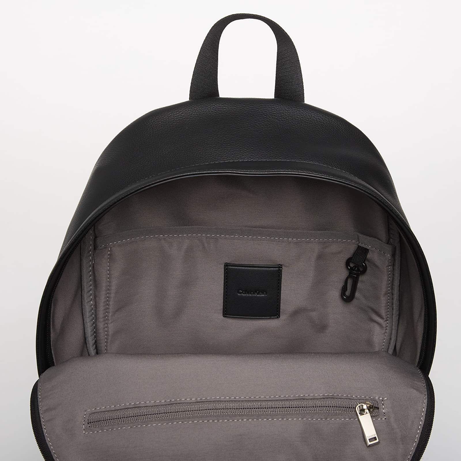 Plecaki męskie Calvin Klein Emblem Aop Emboss Round Backpack Black