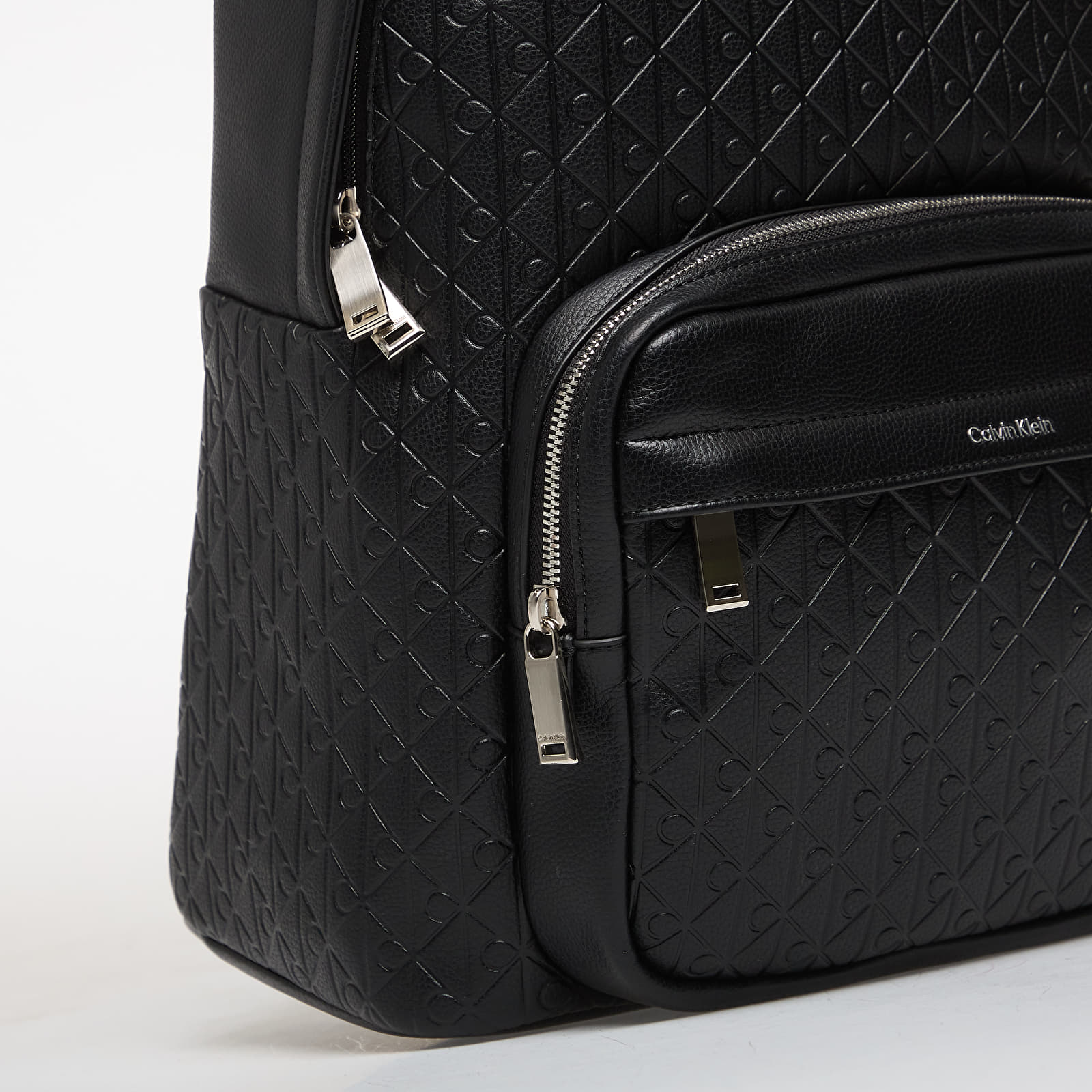 Plecaki męskie Calvin Klein Emblem Aop Emboss Round Backpack Black