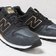 New balance 373 womens black and gold discount