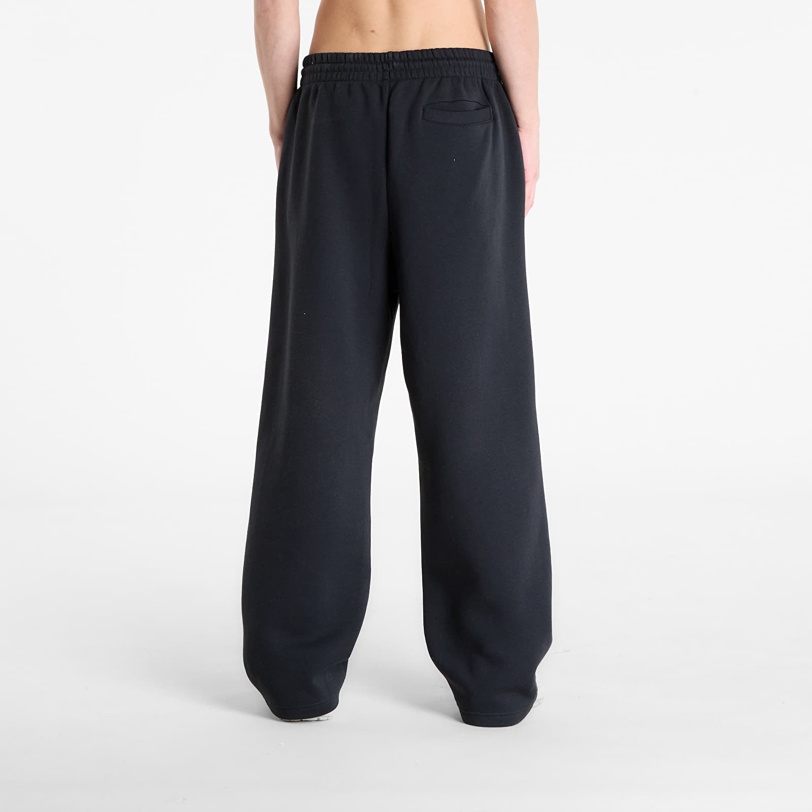 Pánské kalhoty New Balance Linear Graphic Fleece Pant Black