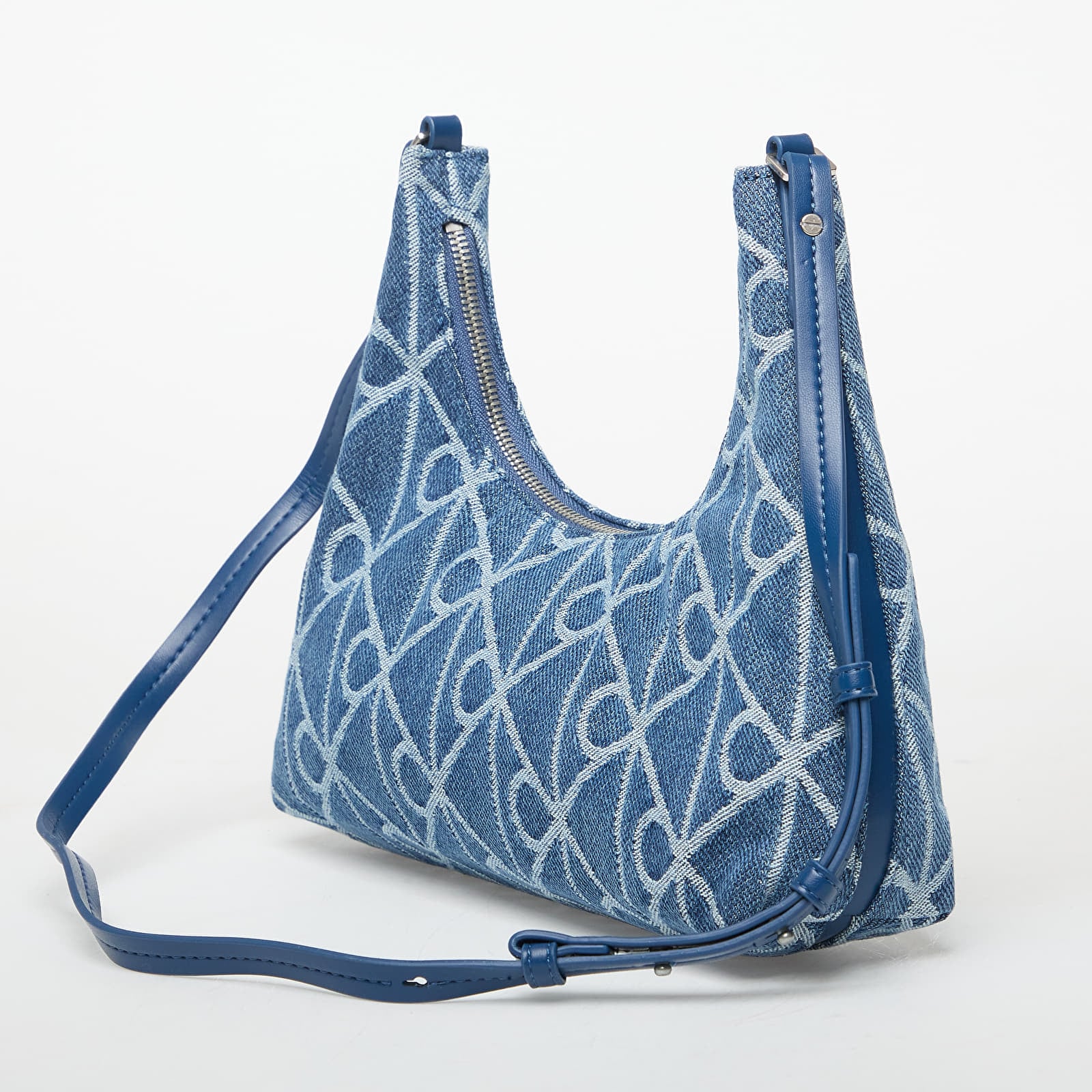 Torby przez ramię Calvin Klein Emblem Aop Denim Sho Blue