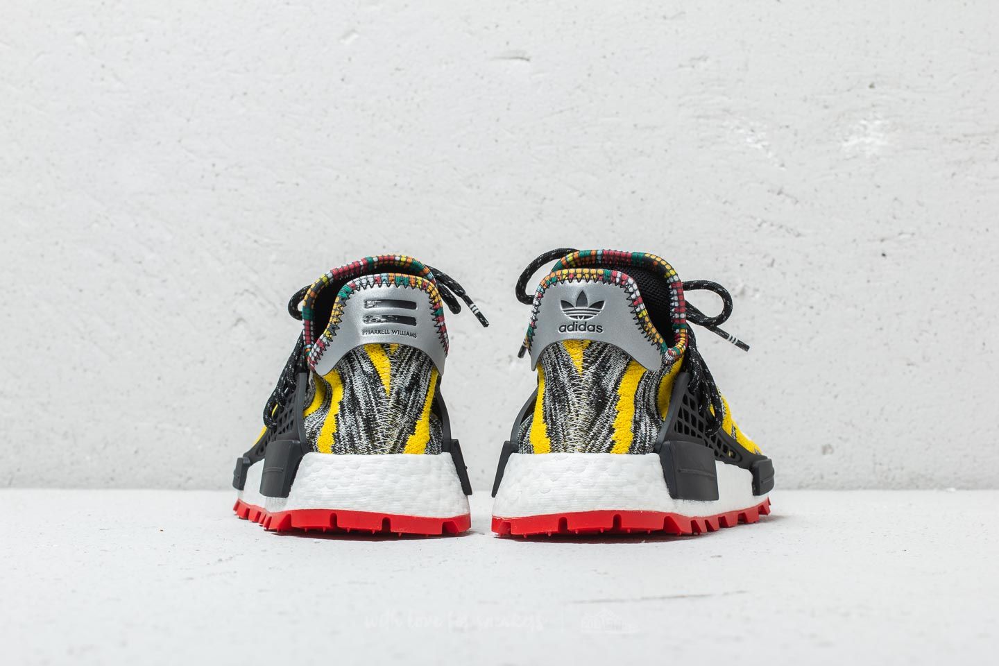 Adidas human race back top