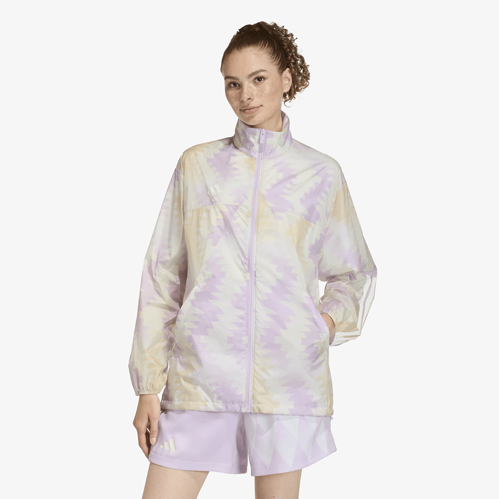 Women's jackets adidas House Of Tiro x Common Goal AOP Windbreaker Wonder White/ Off White/ Ice Lavender