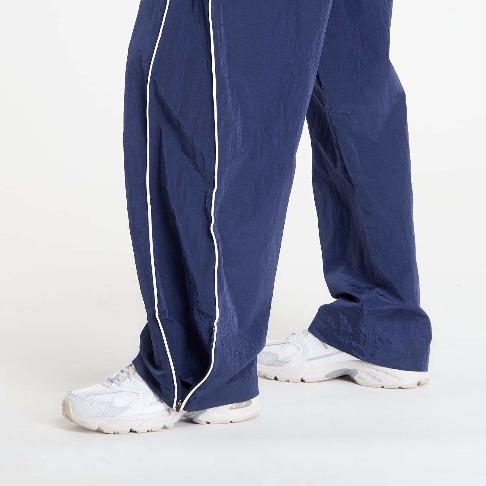 Püksid New Balance Sport Legacy Pant Blue