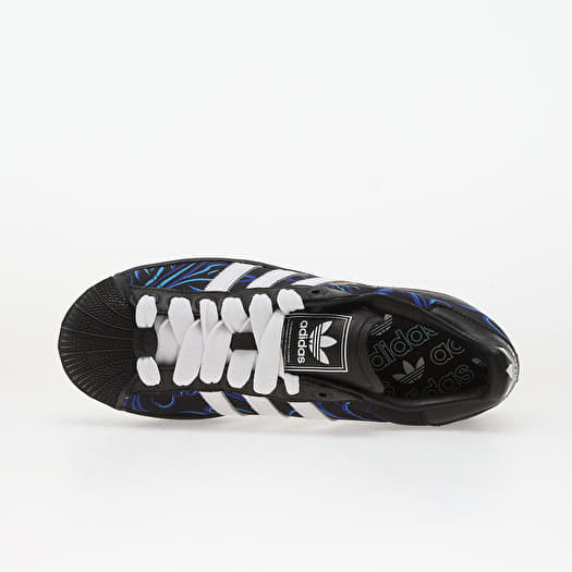 black white and blue adidas