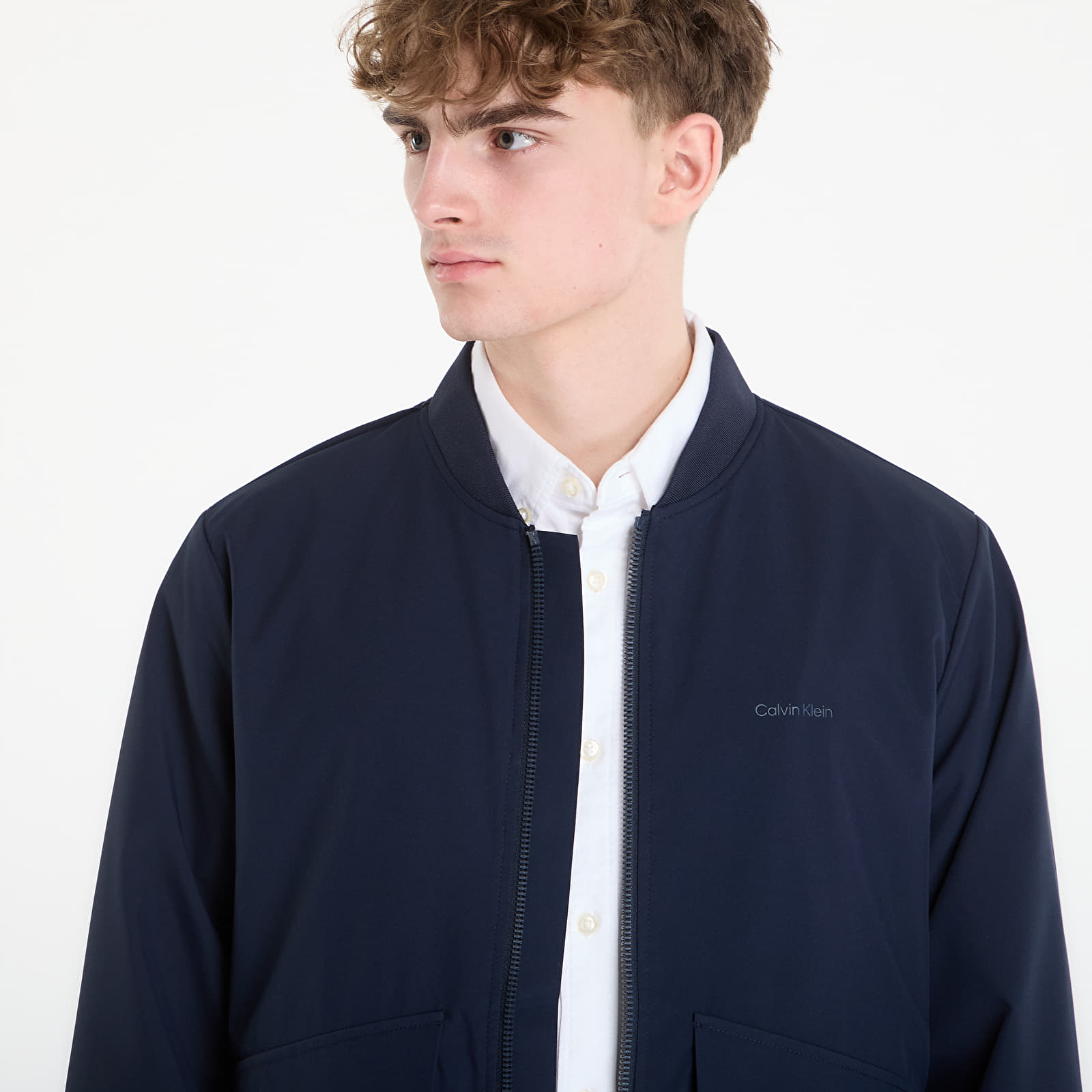 Pánské bundy Calvin Klein Ls Soft Tech Bomber Jacket Dark Sapphire