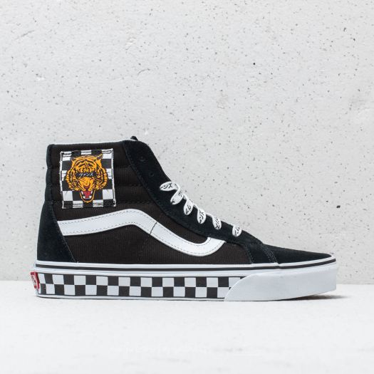 Vans slip store on tiger check