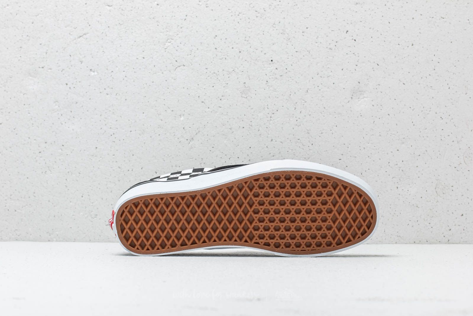 Vans slip 2024 on tiger check