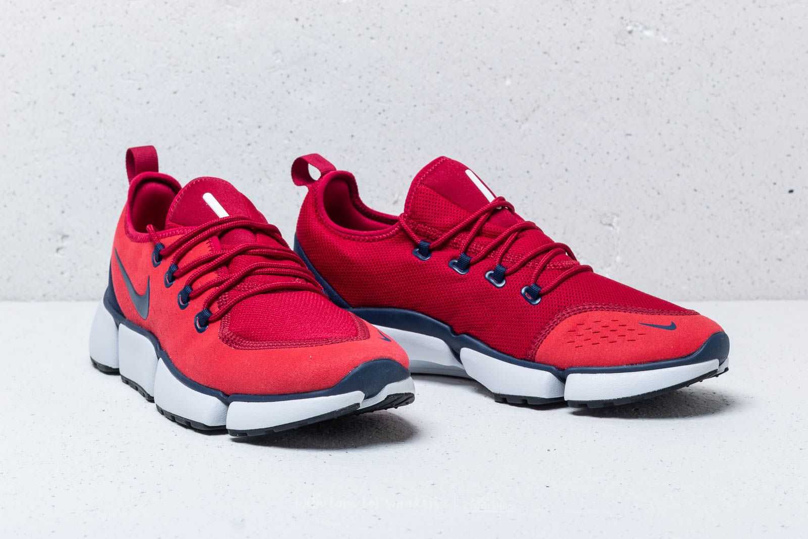 Nike pocket fly rouge online