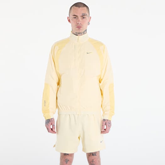 Giacca Nike x NOCTA Northstar Nylon Track Jacket Alabaster/ Lt Laser Orange/ Stealth