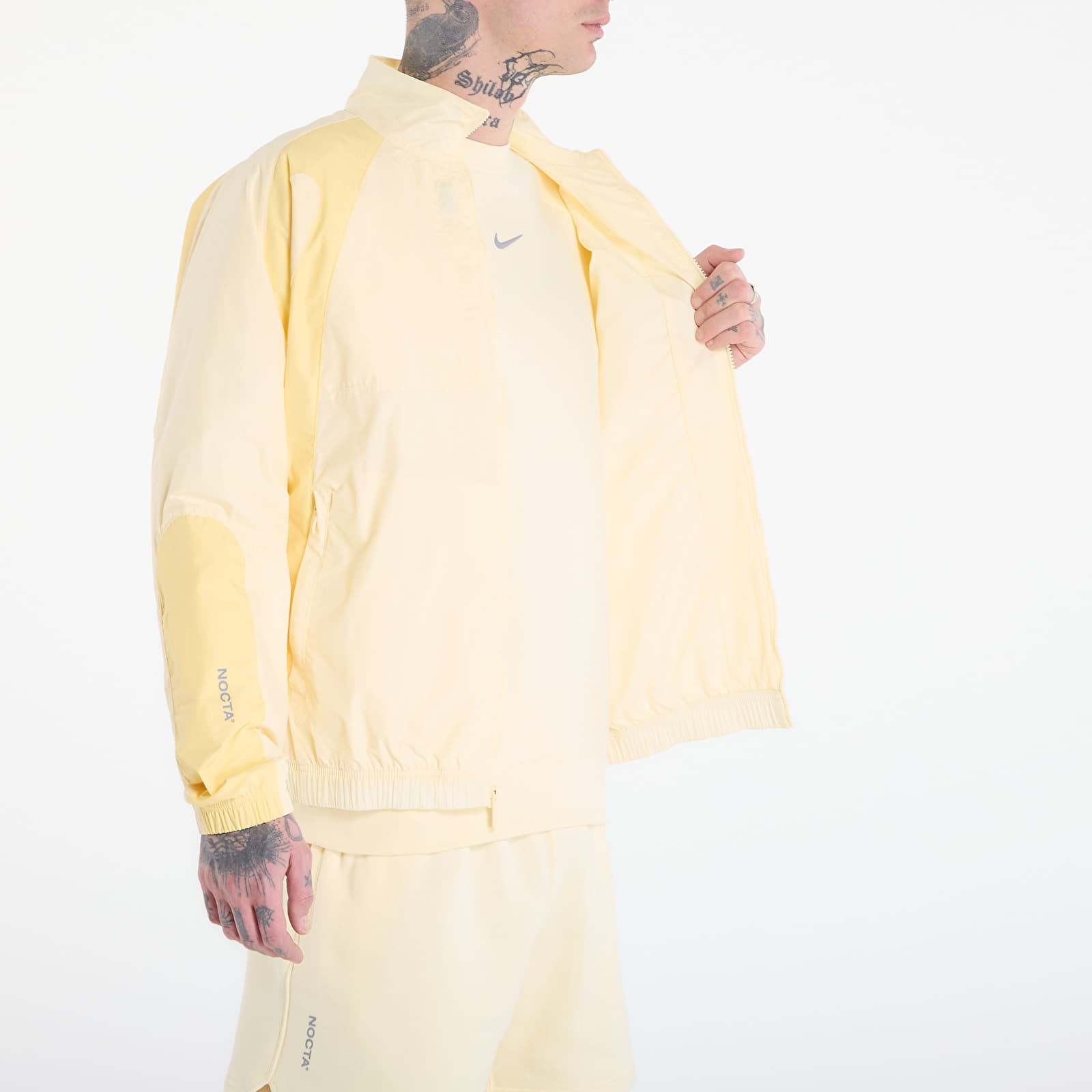 Giacche Nike x NOCTA Northstar Nylon Track Jacket Alabaster/ Lt Laser Orange/ Stealth