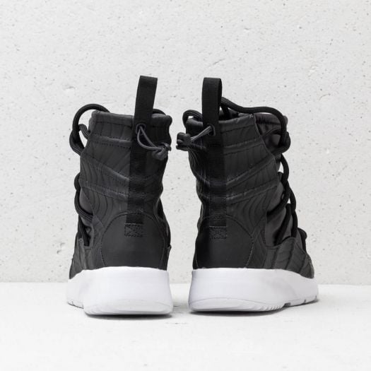 Nike tanjun high rise black sale