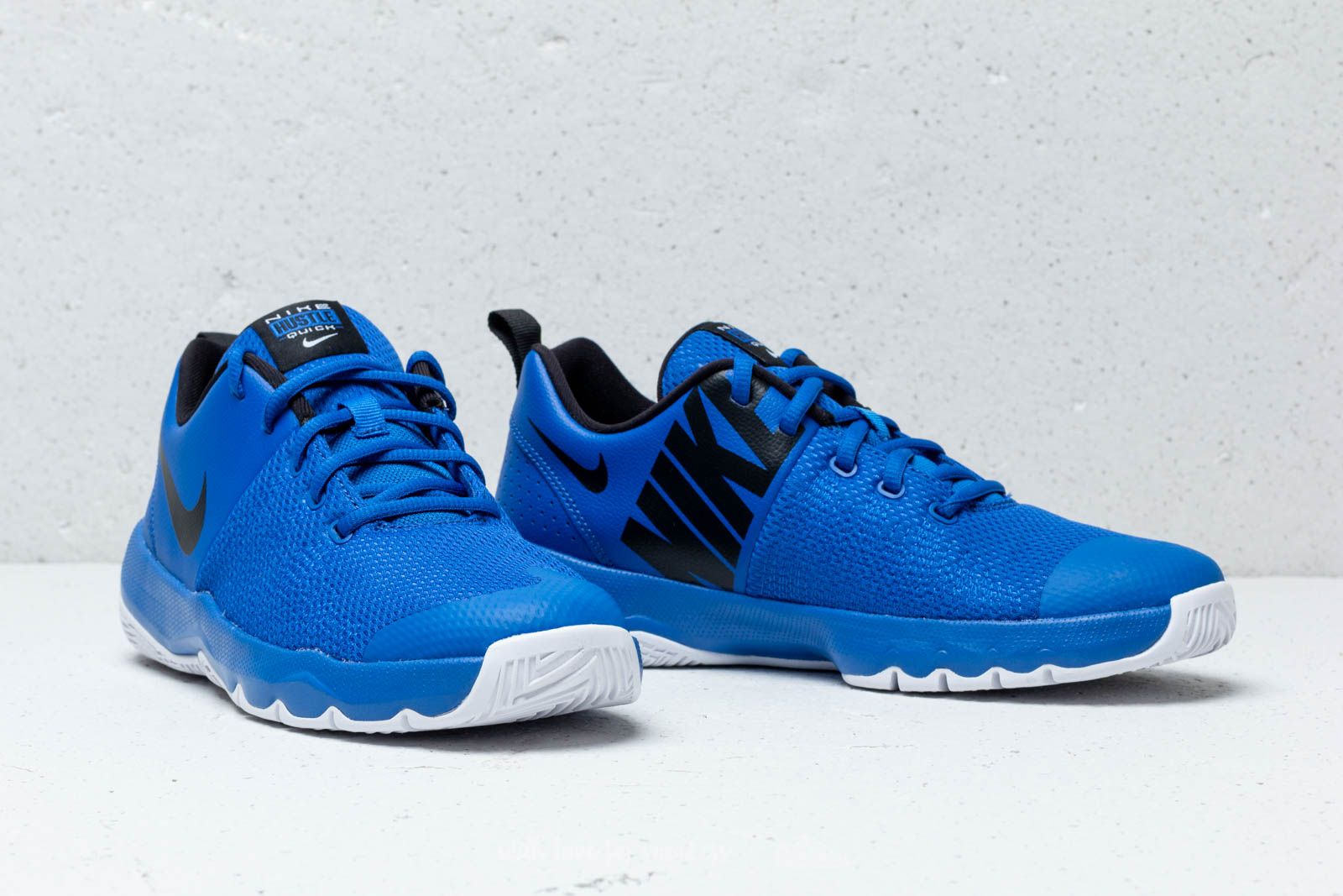 Zapatillas mujer Nike Team Hustle Quick GS Game Royal Black White Footshop