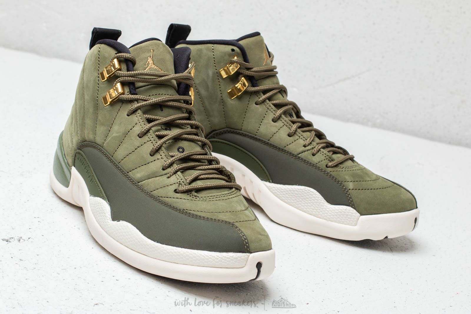 Olive green jordan 12s best sale
