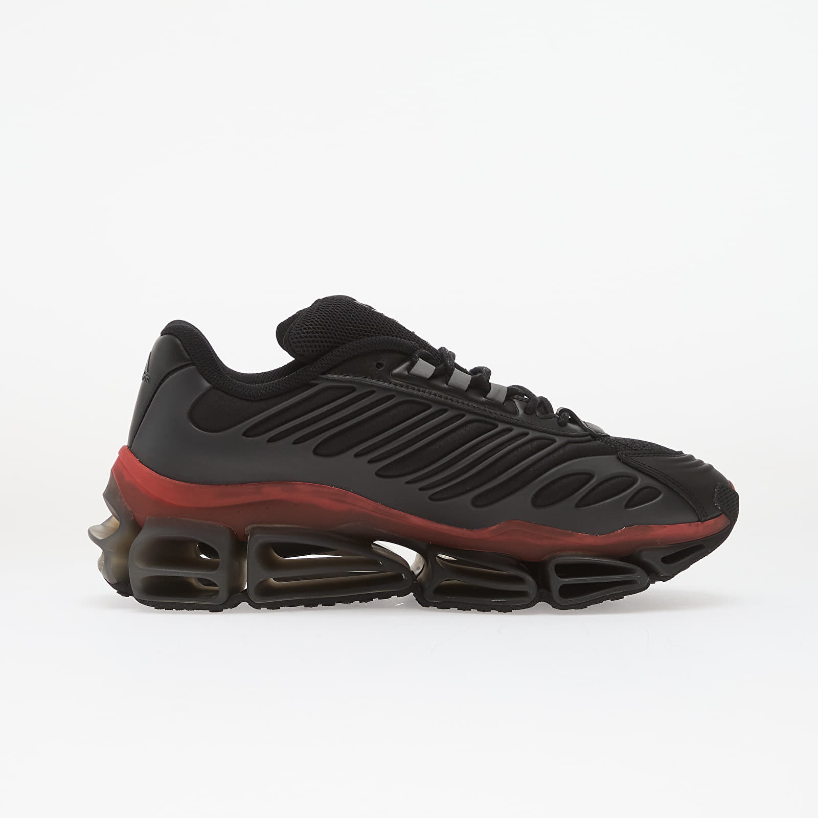 Herenschoenen adidas x Willy Chavarria Megaride Ag Xl Core Black/ Core Black/ Red