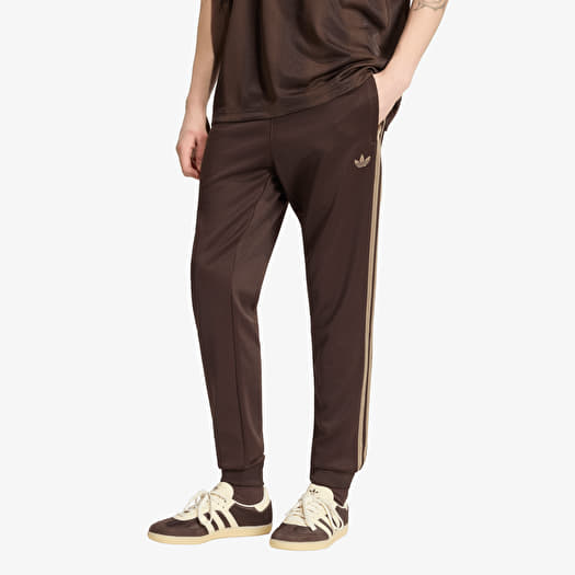Siltās bikses adidas Sst Track Pants Aurora Coffee/ Khaki Six
