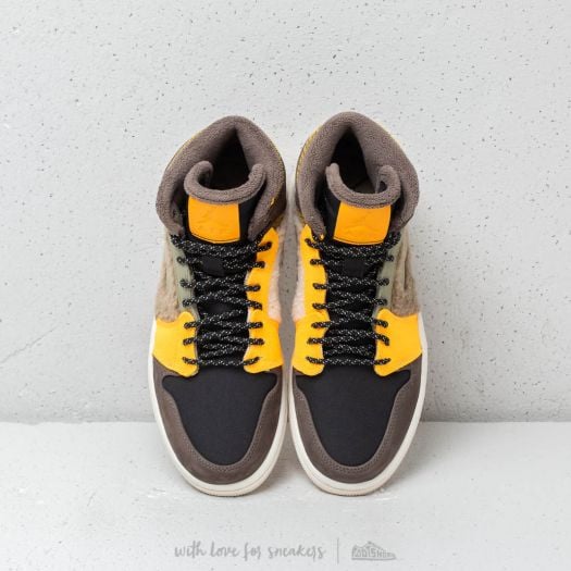Black and yellow jordans womens shop