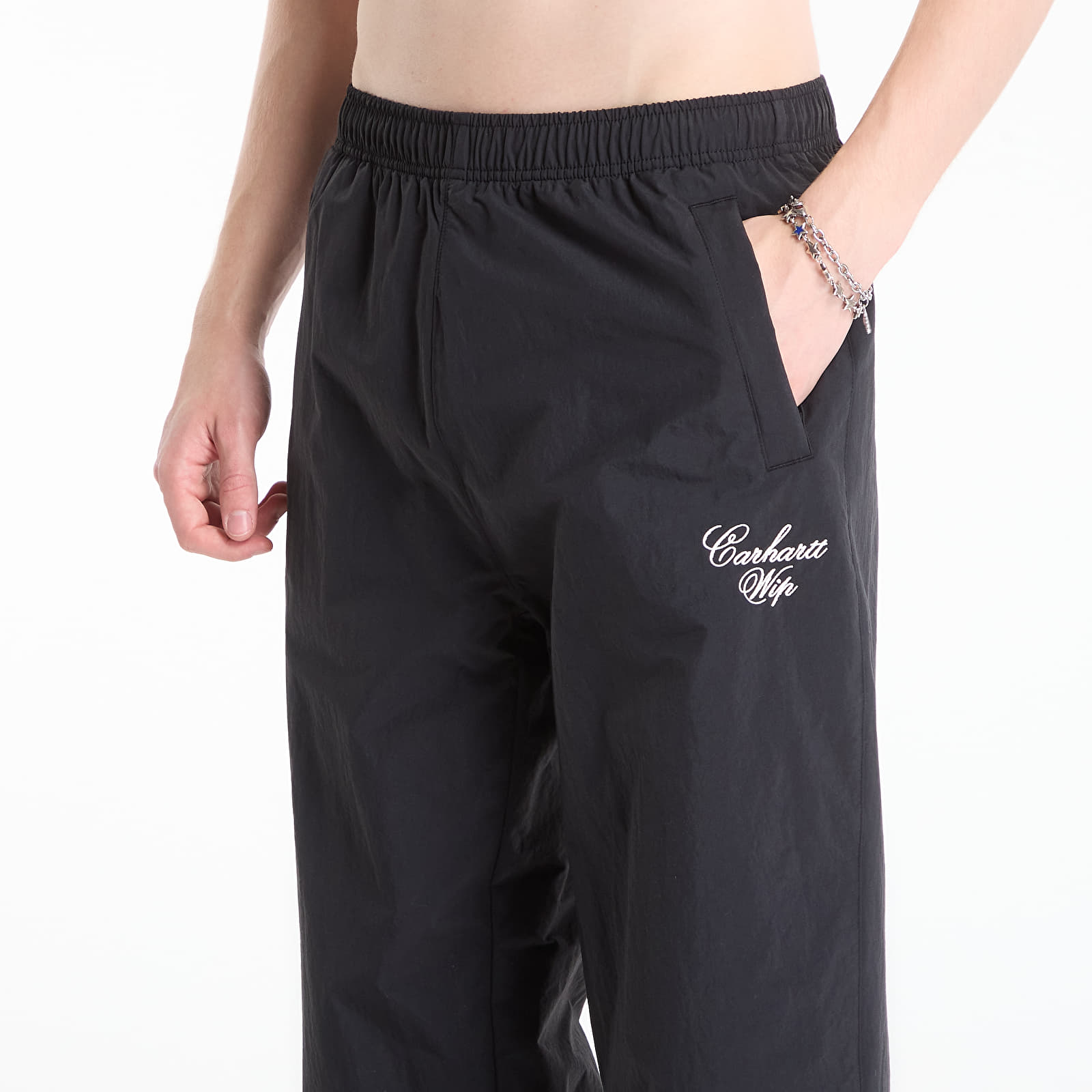 Jogginghosen Carhartt WIP Travon Pant UNISEX Black/ Wax