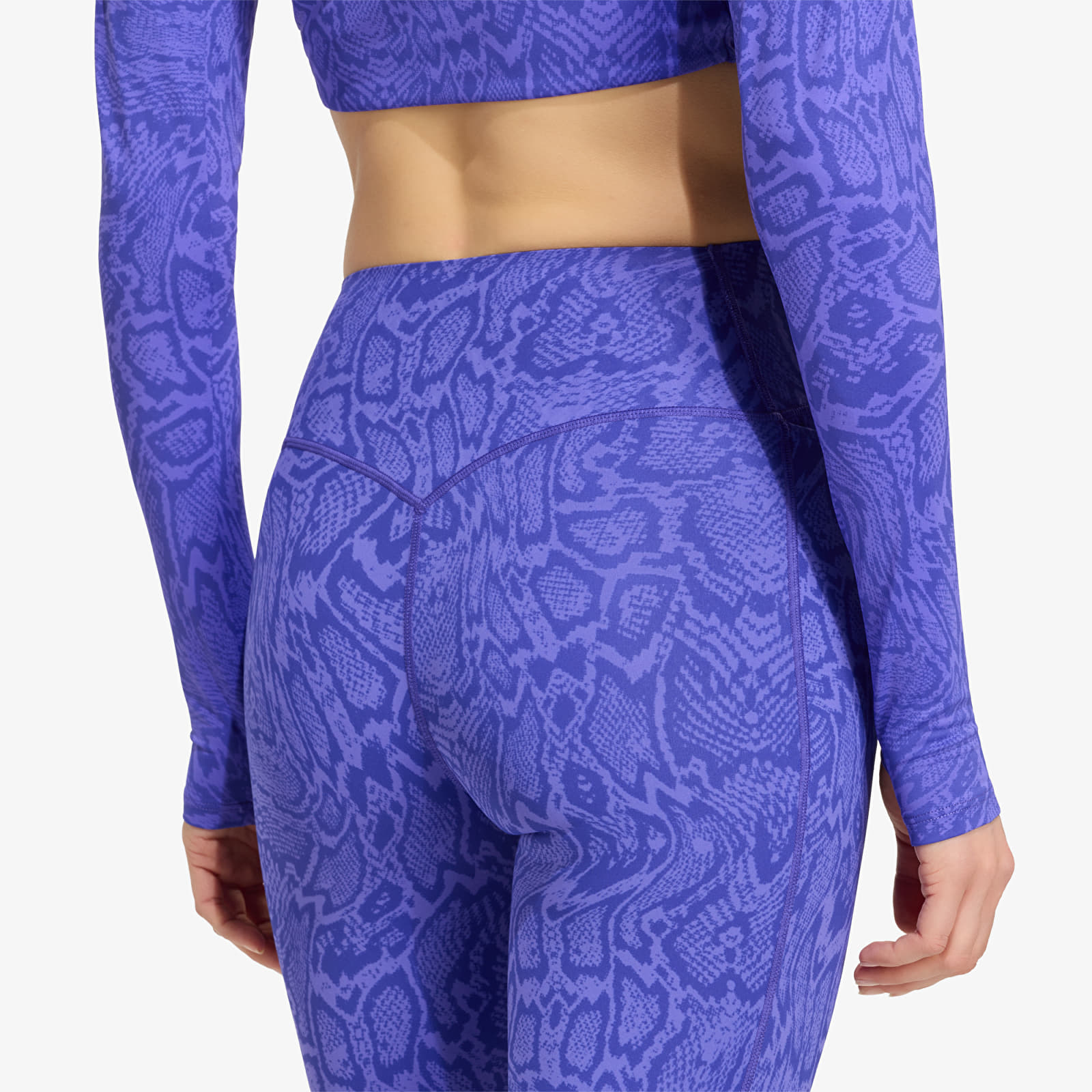 Женские леггинсы adidas Optimé Primelift Snake 7/8 Leggings Solar Purple/ Pure Purple