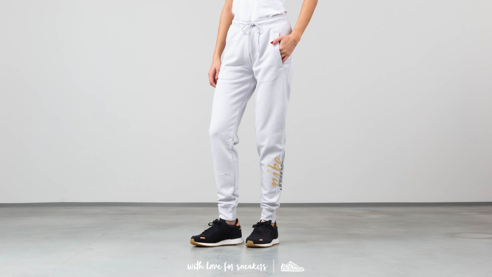 Pants and jeans Nike Sportswear Rally Women s Metallic Pants Grey Footshop