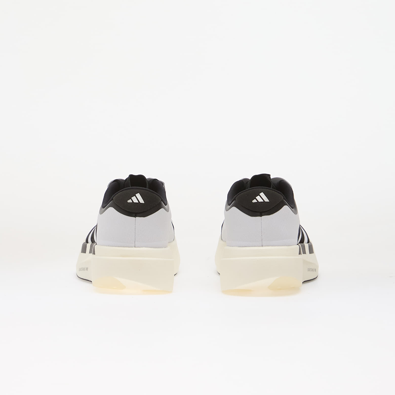 Жіноче взуття adidas ADIZERO EVO SL Zip LIGHTSTRIKEPRO Running Ftwr White/ Core Black/ Silver Met.