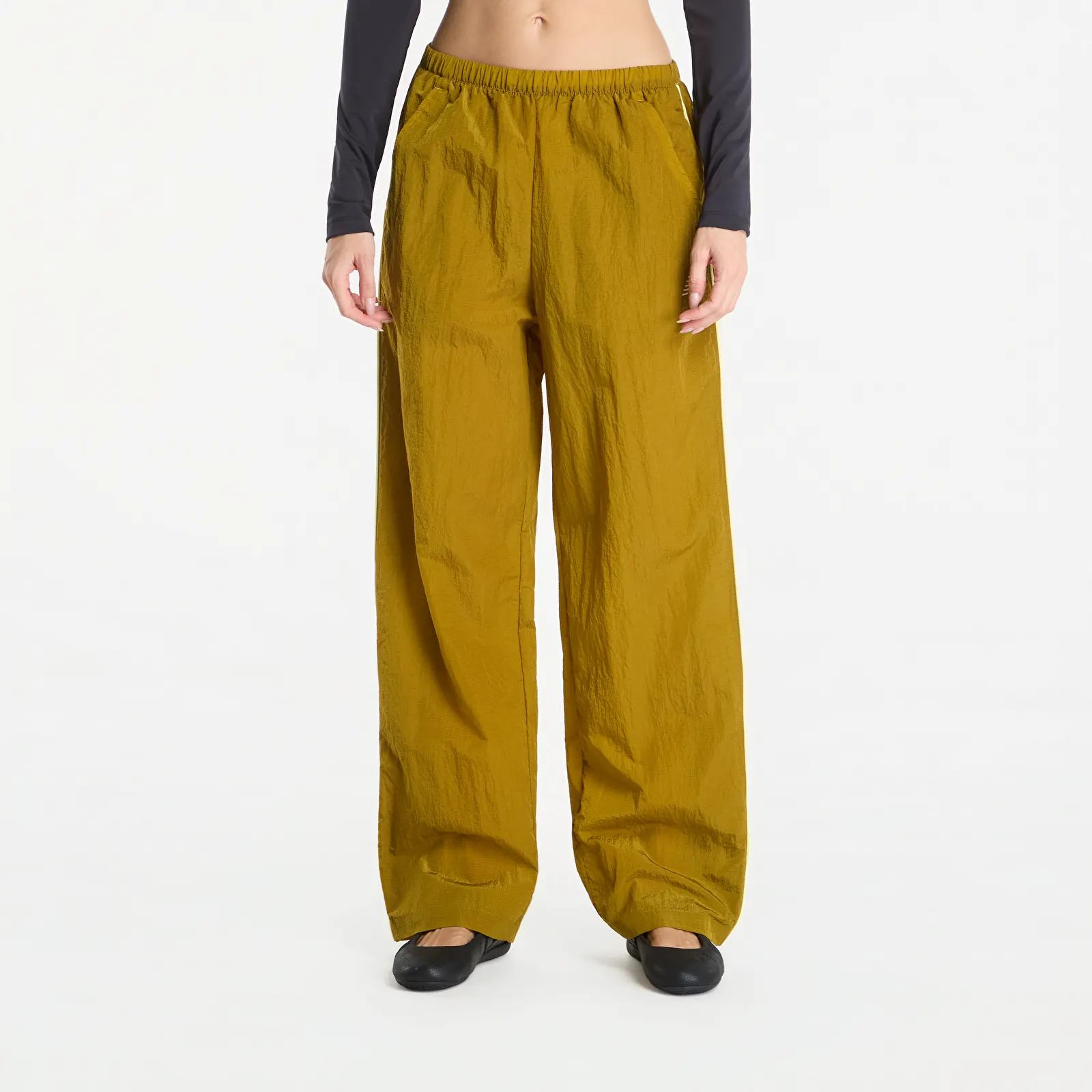 Püksid New Balance Sport Legacy Pant Basil Oil