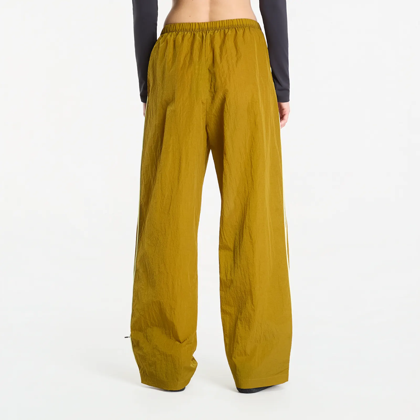 Püksid New Balance Sport Legacy Pant Basil Oil