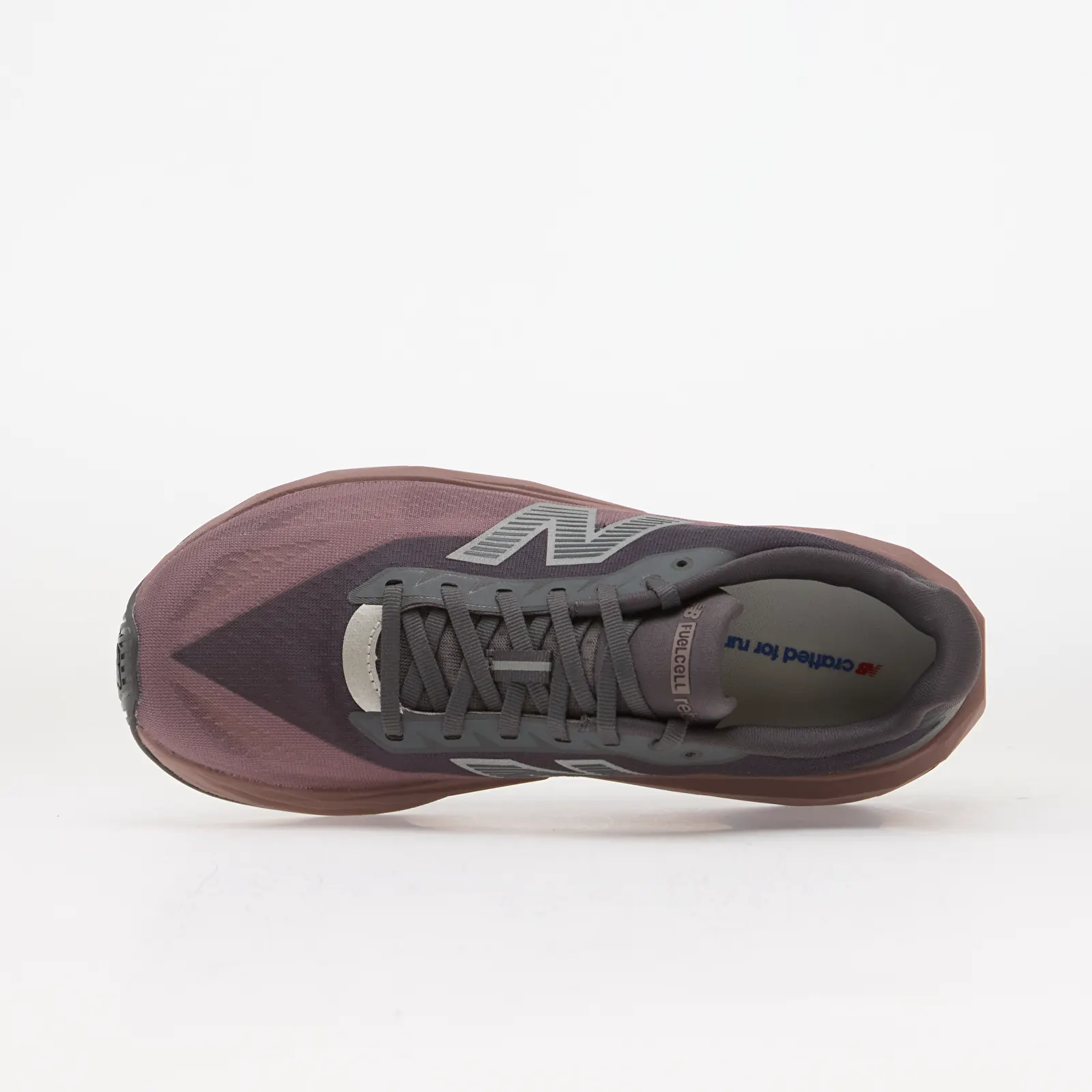 Skor för män New Balance FuelCell Rebel v5 Magnet/ Pebble