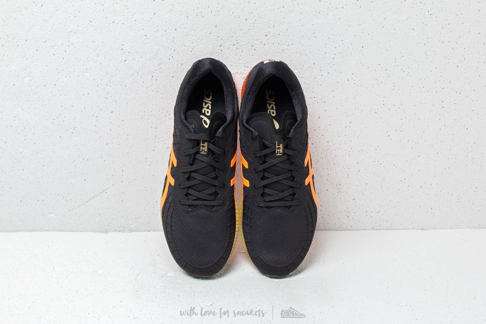 Asics gel quantum infinity black orange top